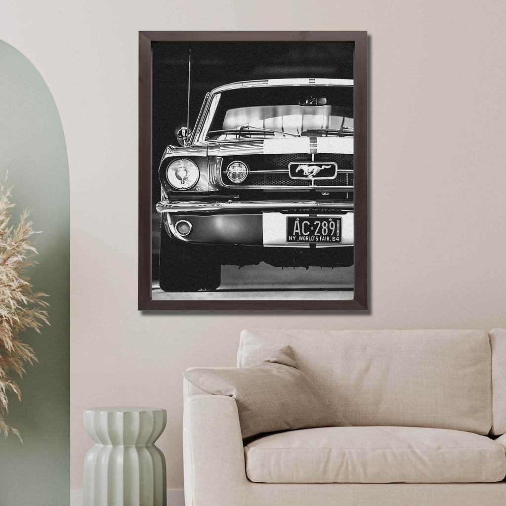 Wownic black-and-white classic muscle car wall art displayed as a framed automotive poster above a modern sofa