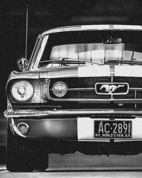 Wownic classic Mustang-inspired muscle car poster featuring a black-and-white front view with pony grille emblem and chrome bumper