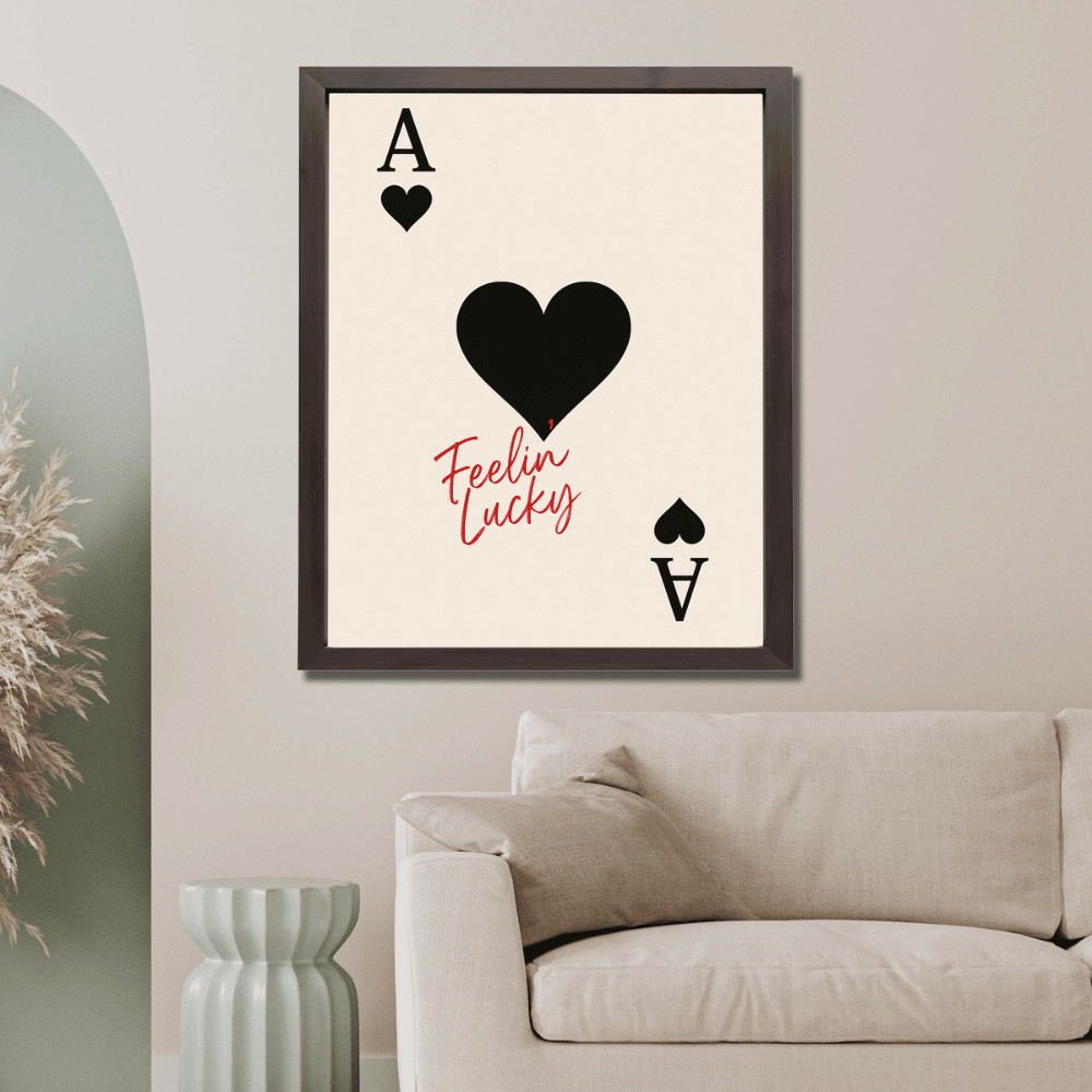 Wownic Feelin Lucky poker wall art displayed as framed retro casino decor above a modern sofa