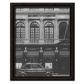Wownic vintage storefront poster featuring ornate black-and-white architecture, luxury boutique details and a classic car